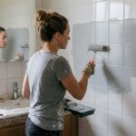 Painting ceramic bathroom tile with a foam roller
